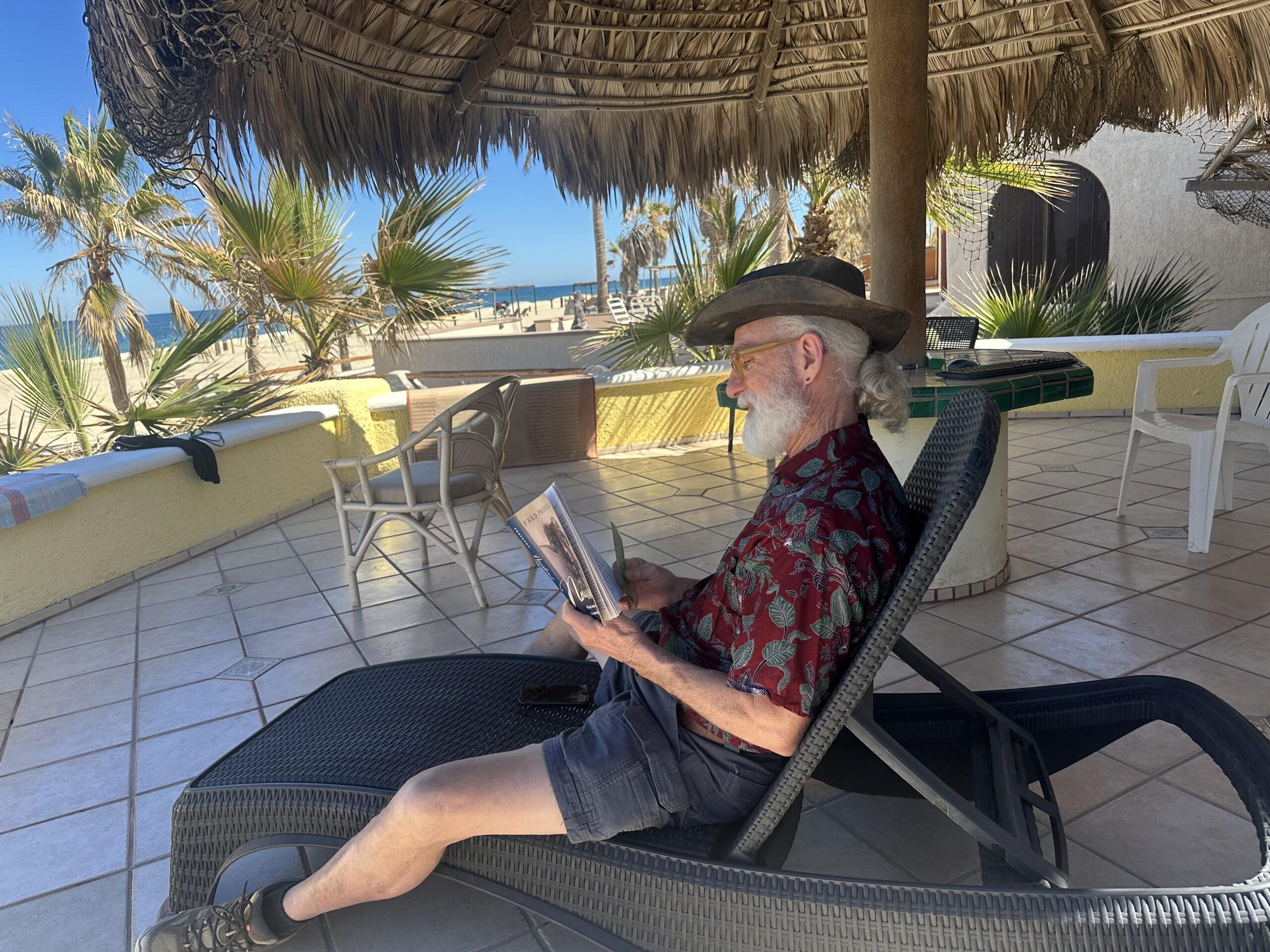 Farmer Steve relaxing and catching up on some reading...